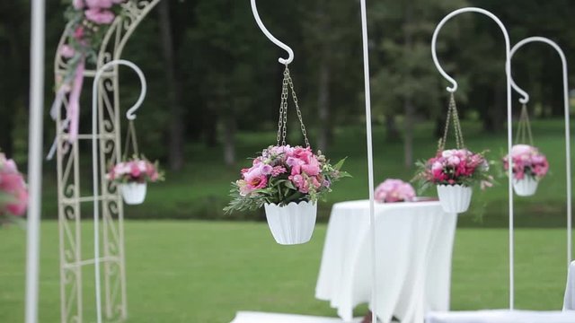 Wedding decorations from red flowers ceremony floristics
