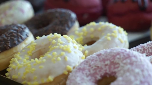 Trays of croissant, donuts and krapfen for breakfast.