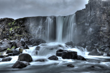 Öxarárfoss waterfall with long exposure - obrazy, fototapety, plakaty