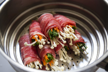 Slice beef roll with mashroom, carrot, chives