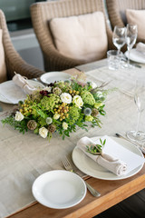 Wedding Banquet or gala dinner. The chairs and table for guests, served with cutlery and crockery....