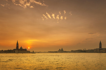 Naklejka premium Sunset over Venice's Grand Canal with views of the island of San Giorgio and St. Mark's Square