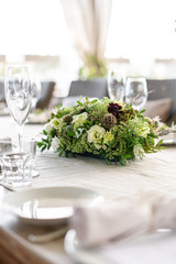 Wedding Banquet or gala dinner. The chairs and table for guests, served with cutlery and crockery....