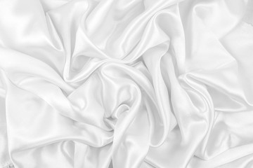 Obraz premium Luxurious of smooth white silk or satin fabric texture background