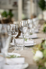 Wedding Banquet or gala dinner. The chairs and table for guests, served with cutlery and crockery....