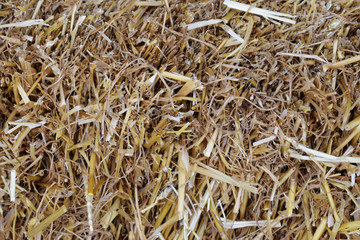 background of dried straw grass, close-up