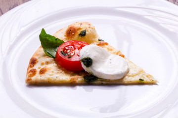 Pizza Caprese with basil