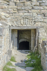 Fototapeta na wymiar Entrance to ruins of medieval castle