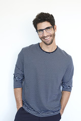 Guy in striped top and glasses, smiling