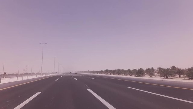 Sandstorm sweeps the sand on highway stock footage video