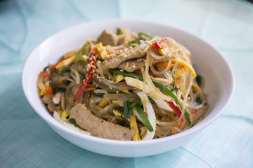 Stir fried Korean glass noodle with soy sauce called Japchae