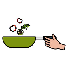 hand with pan cooking vegetables