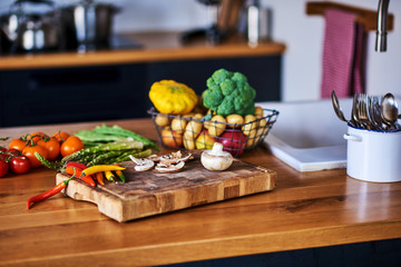 Cooking salad. Vegetables on the table in the kitchen at home.