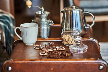 Coffee cup and beans, old coffee grinder. Retro style. Vintage.