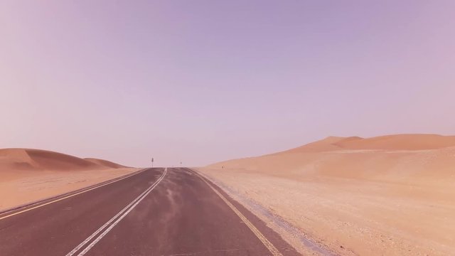 New road from Oasis Liwa to Moreeb Dune in Rub al Khali desert stock footage video