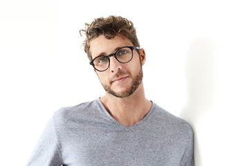 Obraz premium Serious and handsome guy in glasses, portrait