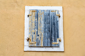 window in old wall of the town of Budva in Montenegro 