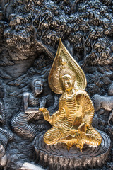 Thai style silver carving art on temple wall , Wat Srisuphan ,Chiang Mai, Thailand.