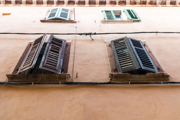 Rovinj, Croatia - July 24, 2018: View of old shutters in the old town of Rovinj, Croatia.