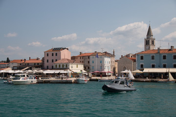Fototapeta premium Rovinj, Croatia - July 24, 2018: View into the small harbour of Fazana, Istria, Croatia.