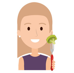 woman with fresh broccoli in fork