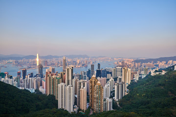 Fototapeta premium Sunset over Victoria Harbor as viewed atop Victoria Peak.