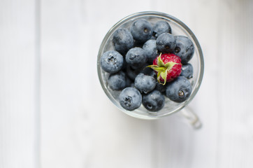 A glass of sweet blueberries