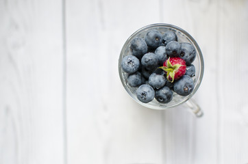 A glass of sweet blueberries