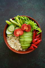 Vegetarian buddha bowl. The concept of healthy diet. Dark green background

