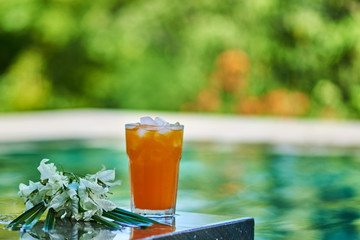 Fruit cocktail glass at pool