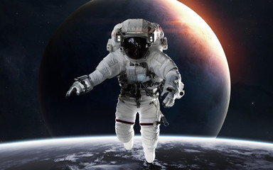 Uranus with astronaut in front of planet. Solar system. Elements of this image furnished by NASA