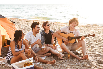 Group of excited young friends having fun time together