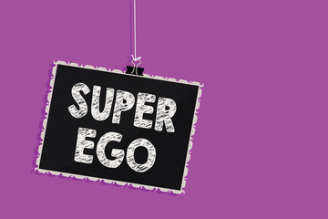 Text sign showing Super Ego. Conceptual photo The I or self of any person that is empowering his whole soul Hanging blackboard message communication information sign purple background.