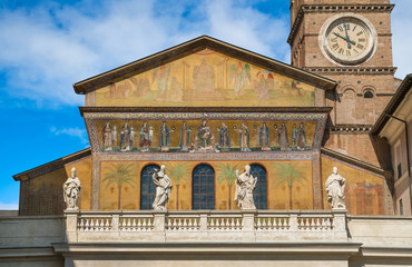 Facade with medieval mosaic of the Basilica of Santa Maria in Trastevere, Rome, Italy.