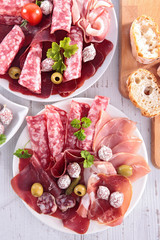 assorted salami and bacon