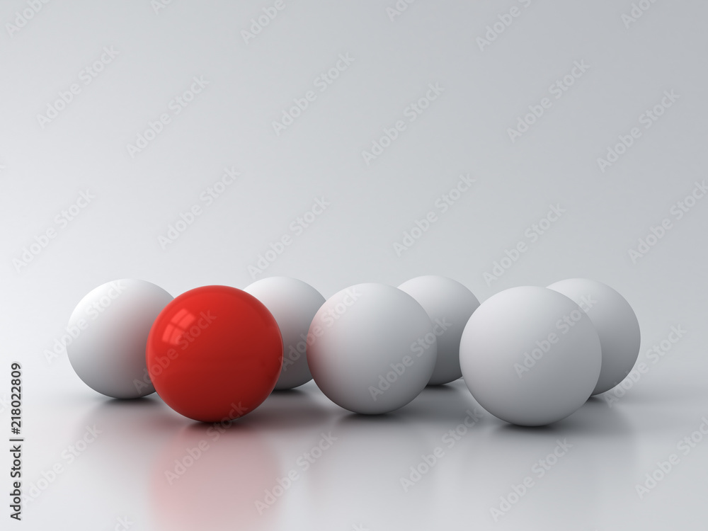 Aufkleber stand out from the crowd and different creative idea concepts one red sphere standing among white sp