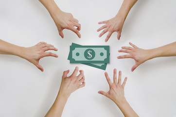 Top view on Pulling out hands for money. Attempt to grab money with hands. The concept of ordering...