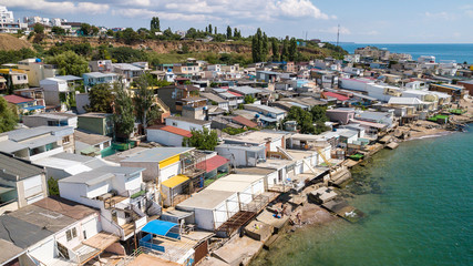 Obraz premium The destroyed house after the earthquake on the seashore