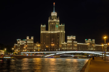 Fototapeta premium Moscow city landscape with night view on skyscraper on embankment river.