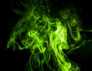 Green smoke on black background