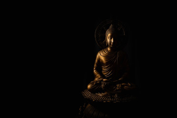 Buddha portrait isolated on black