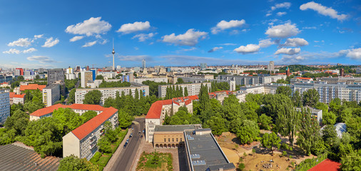 Eastern Berlin from above: modern buildings, television tower on Alexanderplatz and city skyline
