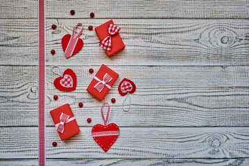 Red Christmas decoration on white wooden board  with copy space. Merry christmas. Top view with copy space.