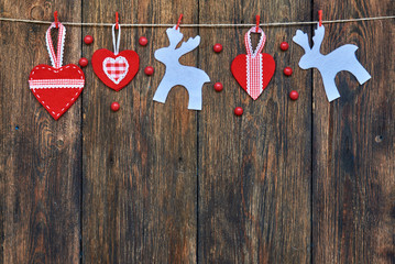 Christmas festive homemade decorations on wooden background.