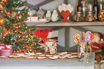 Gingerbread cookies jar Christmas tree room background. Preparation for Christmas holiday.