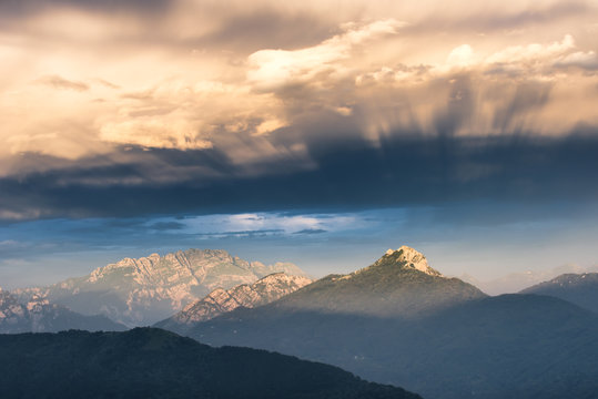 Rare sunset view of Corni di Canzo and mount Resegone under a beautiful and dramatic sky. Lombardy region, Lecco and Como province, Italy. © Marco