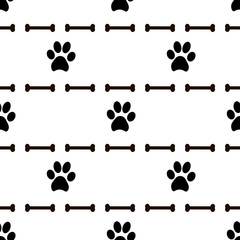 Seamless patterns with black animal footprints and bones.