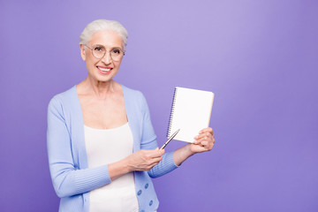 Gray haired old smiling business woman wearing glasses, showing 