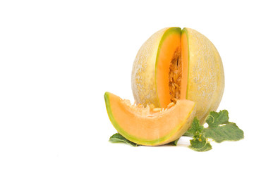 
Ripe organic Cantaloupe melon with leaves isolated on a white background.space for your text. 