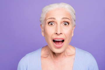 Portrait of gray haired old beautiful angry shocked woman with o